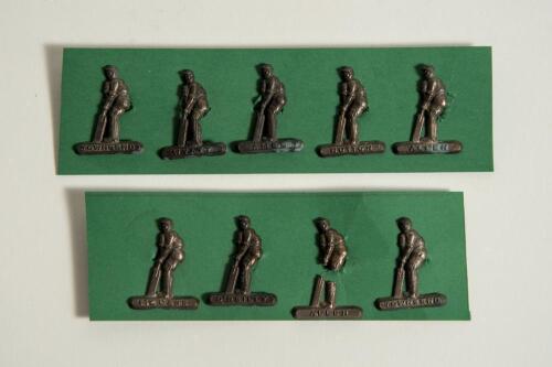 England v Australia &lsquo;Ashes&rsquo; 1938. Nine individual metal badges of a batsman at the wicket with named base at the bottom of the badge, bush through button fastening to back of each badge. Players named on the badges are Hutton, Townsend, Allen, Wyatt, Ames