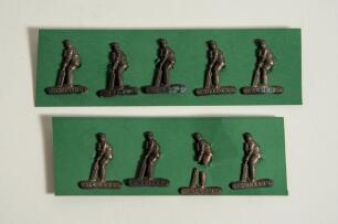 England v Australia &lsquo;Ashes&rsquo; 1938. Nine individual metal badges of a batsman at the wicket with named base at the bottom of the badge, bush through button fastening to back of each badge. Players named on the badges are Hutton, Townsend, Allen, Wyatt, Ames