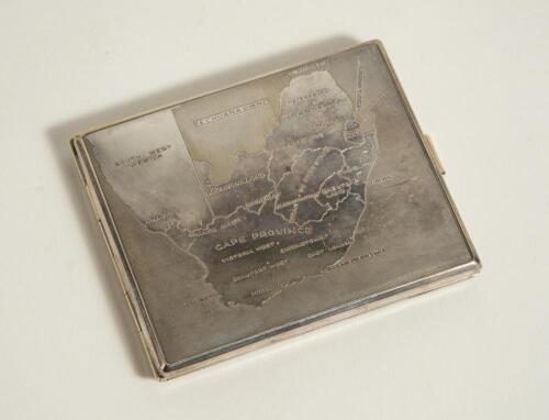 M.C.C. tour of South Africa 1938/39 &lsquo;Timeless Test Series&rsquo;. Silver plated cigarette case with machine decoration showing a map of South Africa to top. The case made by &lsquo;Greenacre&rsquo;s of Durban, South Africa and in original box. The cigarette case measures a
