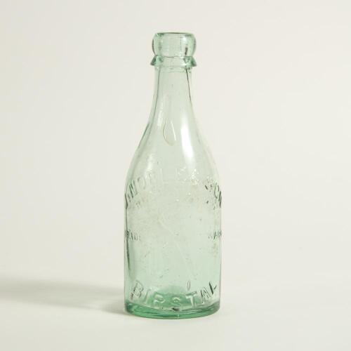 Cricket bottle. Attractive cricket glass lemonade bottle with &lsquo;B. Noble of Birstall&rsquo; with figure of a batsman, stumps and ball to side of bottle. circa 1890/1900. Approximately 8&rdquo; tall. Good/very good condition