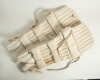 Leather cricket bag and kit. An early leather cricket bag containing a full size bat by Cobbett of Marylebone with serial number D.50291 stamped to rear splice. A pair of &lsquo;Tony Lock Junior&rsquo; size 8 canvas cricket boots, hardly used. Also two pairs of batti - 7