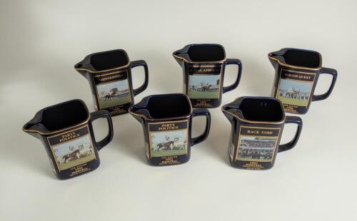 Martell Grand National commemorative water jugs 1992 to 2004. Nice selection of twelve jugs for the Grand National winners, &lsquo;Party Politics&rsquo; 1992 (two, limited edition of 10000), &lsquo;Race Void&rsquo; 1993 (False start, limited edition of 5000), &lsquo;Miinnehoma&rsquo; 1994 (