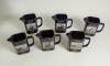 Martell Grand National commemorative water jugs 1992 to 2004. Nice selection of twelve jugs for the Grand National winners, &lsquo;Party Politics&rsquo; 1992 (two, limited edition of 10000), &lsquo;Race Void&rsquo; 1993 (False start, limited edition of 5000), &lsquo;Miinnehoma&rsquo; 1994 ( - 2