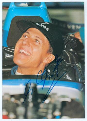 Motorsport. Michael Schumacher. Formula 1. Four page colour magazine extract, the first page featuring a full page image of a smiling Schumacher in the cockpit of his car. Signed by Schumacher. 8.25&rdquo;x11.75&rdquo;. Very good condition.
