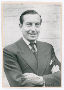 Henry Cotton. Original mono photograph of Cotton, head and shoulders wearing suit and tie. Signed in black ink &lsquo;Henry Cotton&rsquo;. The photograph probably taken in the 1940s. Photographer unknown. 5.5&rdquo;x8&rdquo; laid to trimmed card. Very good condition.