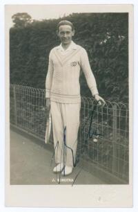 Jean Laurent Robert Borotra. 1930s. Sepia real photograph postcard of Borotra standing full length in tennis attire. Very nicely signed in black ink to the photograph &lsquo;J. Borotra&rsquo;. Printed title to lower edge. Publisher&rsquo;s blind embossed stamp to lower rig