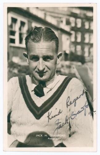 John Herbert &lsquo;Jack&rsquo; Crawford. Mono real photograph postcard of Crawford, head and shoulders wearing tennis sweater and tie. Very nicely signed in ink to the photograph &lsquo;Kind regards, Jack Crawford 1936[?]&rsquo;. Printed title &lsquo;Jack H. Crawford. Australia&rsquo;. Pub