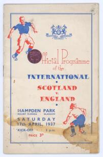 Scotland v England 1937. Official programme for the British Home Championship international match played at Hampden Park, 17th April 1937. Yellow community singing sheet for the match bound in. No annotations. Staining to front wrapper and first page, sma
