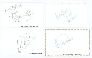 Indian Test cricketers. Four good ink signatures of Mohammad Azharuddin, Chandrakant Pandit, Manoj Prabhakar and Narendra Hirwani on cards. Good condition