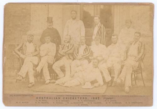 &lsquo;The Australian Cricketers 1882&rsquo;. Original cabinet card sepia photograph of twelve members of the Australian touring party seated and standing in rows wearing caps and blazers. Printed title &lsquo;The Australian Cricketers 1886&rsquo; and players names printed to lo