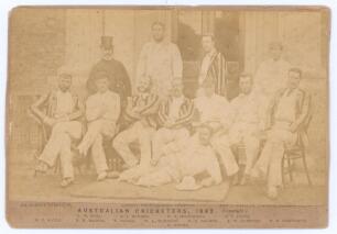 &lsquo;The Australian Cricketers 1882&rsquo;. Original cabinet card sepia photograph of twelve members of the Australian touring party seated and standing in rows wearing caps and blazers. Printed title &lsquo;The Australian Cricketers 1886&rsquo; and players names printed to lo