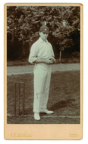 William James Whitty. New South Wales, South Australia & Australia, 1907-1926. Excellent extra large mono &lsquo;Imperial&rsquo; cabinet card of Whitty, full length in bowling pose holding the ball and wearing Australian cap. Very nicely signed in black ink to the ph
