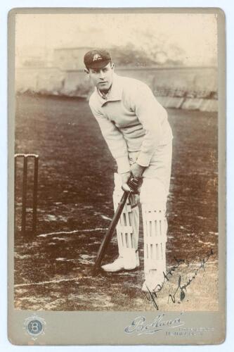 Victor Thomas Trumper. New South Wales & Australia 1894-1914. Excellent sepia cabinet card photograph of Trumper, full length, wearing Australian cap and in batting pose at the wicket. Nicely signed to lower right hand corner of image, &lsquo;Yours truly, V. Tr
