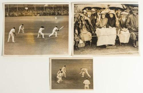 Australia tour to England 1926. Three original mono press photographs of match action from the tour. Includes two photographs from the first Test at Trent Bridge 12th June 1926, Sutcliffe playing an attacking shot, and an excellent image of spectators in 