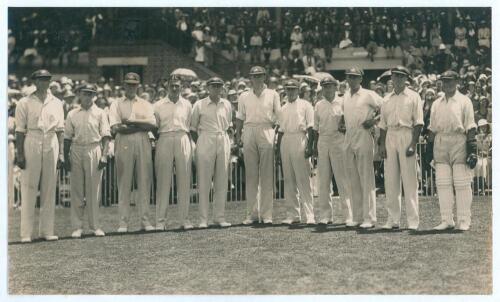 Australia v England. 2nd Test, &lsquo;Bodyline&rsquo; Melbourne Cricket Ground December 1932. Excellent original press photograph of the Australian team who played England in the second Test at Melbourne. The players are pictured on the field just prior to them field