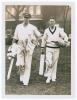 Australia tour to England 1934. Original sepia press photograph of Australian batsmen Ernest Bromley and Bill Brown walking out for net practice at Lord&rsquo;s on the 1934 tour. Very nicely signed in ink to the photograph by Brown. 6&rdquo;x8&rdquo;. Sport & General, Lond