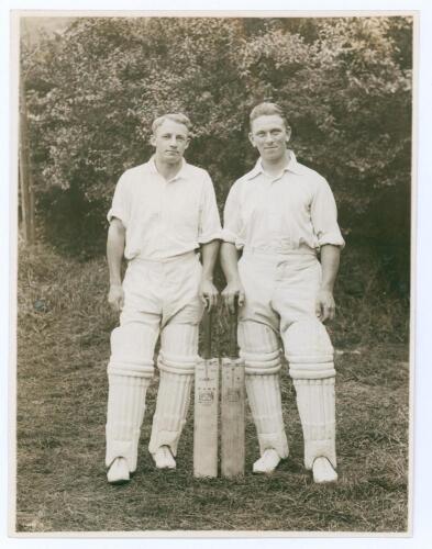 Donald George Bradman. New South Wales, South Australia & Australia 1927-1949 and Maurice Leyland, Yorkshire & England 1920-1947. Excellent mono photograph of the two players, full length, wearing full cricket attire each holding and displaying their own 
