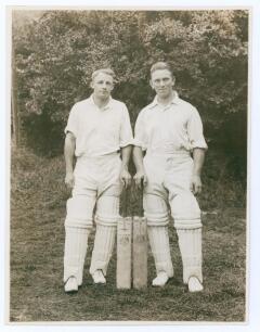 Donald George Bradman. New South Wales, South Australia & Australia 1927-1949 and Maurice Leyland, Yorkshire & England 1920-1947. Excellent mono photograph of the two players, full length, wearing full cricket attire each holding and displaying their own 