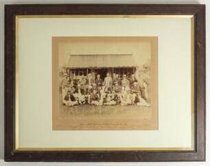 M.C.C. v West Suffolk Cricket Club 1902. Official photograph of the two teams and umpires sitting and standing in rows in front of the pavilion at Bury St Edmunds, Suffolk. Players include Campbell Hulton, James Gilman, William Coleman, William East, Regi