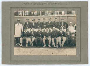 M.C.C. tour to Australia 1920/21. Official sepia photograph of the M.C.C. touring party seated and standing in rows wearing cricket attire and blazers. Laid down to photographer&rsquo;s mount with printed title to upper border, &lsquo;With the compliments of &ldquo;The Dai