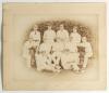 Oxford University 1887. Original sepia photograph of the Oxford University team, seated and standing in rows wearing cricket attire. Photograph laid down to official photographers mount with players&rsquo; names handwritten in pencil to lower border. Players i