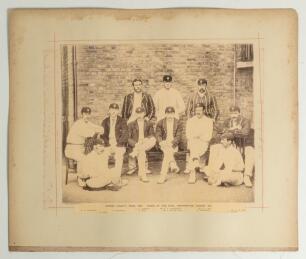 &lsquo;Surrey County Team, 1891. Taken at The Oval, Kennington, August 3rd&rsquo;. Large original sepia photograph of the Surrey team seated and standing in rows wearing cricket attire, Surrey caps and assorted blazers. Printed title and players&rsquo; names to lower borde