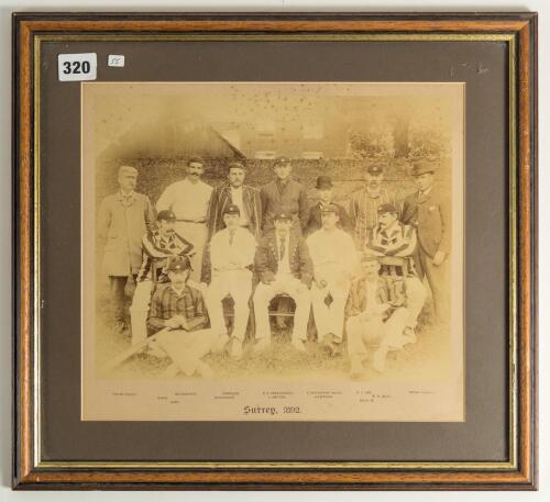 Surrey C.C.C. 1892. Rare and impressive official sepia photograph of the Surrey team, two umpires and scorer, seated and standing in rows wearing caps and blazers. The photograph is laid down to official photographers mount with title &lsquo;Surrey, 1892&rsquo; and p