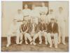 Nottinghamshire C.C.C. 1903. Nice early original sepia photograph of the Nottinghamshire team seated and standing in rows in front of a pavilion, wearing cricket attire, some in caps and blazers. Players include J.A. Dixon, Gunn, Jones, Shrewsbury, Iremon