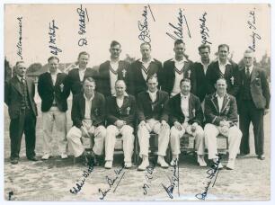 Surrey County Cricket Club circa1950. Good mono press photograph of the Surrey team, standing and seated in rows, wearing club blazers. The photograph, by Barratt&rsquo;s Photo Press Ltd, nicely signed in ink by twelve of the players featured including Barton (