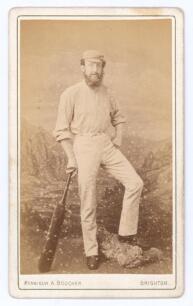 Charles Hamlin Smith. Sussex 1861-1874. Early carte de visite sepia studio photograph card of Smith in cricket attire holding bat to side. The photograph by &lsquo;Monsieur A. Boucher of Brighton, with advertising to verso. Overall 2.5&rdquo;x4.25&rdquo; Minor speckling to