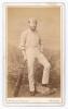 Charles Hamlin Smith. Sussex 1861-1874. Early carte de visite sepia studio photograph card of Smith in cricket attire holding bat to side. The photograph by &lsquo;Monsieur A. Boucher of Brighton, with advertising to verso. Overall 2.5&rdquo;x4.25&rdquo; Minor speckling to