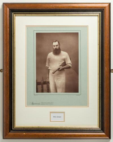 William Gilbert Grace. Large impressive sepia photograph of Grace, three quarter length, wearing cricket whites and holding a cricket bat under his arm. W&S Ltd. Barraud of Oxford Street, London 1888. Produced as part of a series of photographs of famous