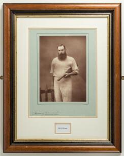 William Gilbert Grace. Large impressive sepia photograph of Grace, three quarter length, wearing cricket whites and holding a cricket bat under his arm. W&S Ltd. Barraud of Oxford Street, London 1888. Produced as part of a series of photographs of famous