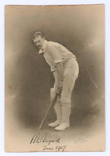 Bertram Lewis Bisgood. Somerset 1907-1921. Original sepia studio photograph of Bisgood, in batting pose, wearing cricket attire. Signed to lower border in ink by Bisgood and dated June 1907. The card by Jas Bacon and Sons of Leeds 1907. 5&rdquo;x7.5&rdquo;. The photo
