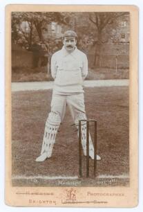 Gregor MacGregor. Cambridge University, Middlesex & England 1888-1907. Original sepia cabinet card photograph of MacGregor standing full length wearing wicket-keeping attire at the wicket and wearing Middlesex cap. E. Hawkins & Co. of Brighton. Card measu