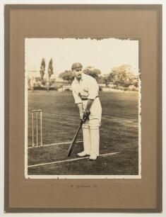 John Tyldesley. Lancashire & England 1895-1923. Excellent original mono photograph of Tyldesley in batting pose standing at the crease wearing a Lancashire cap. Photograph laid down to original photographer&rsquo;s mount with handwritten title to lower border &lsquo;