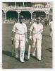 Jack Hobbs and Herbert Sutcliffe. Original mono photograph of Hobbs and Sutcliffe walking out to bat at Scarborough. Very nicely signed in ink to the photograph by both players. Date and photographer unknown, probably 1920s. 6.5&rdquo;x8.5&rdquo;. Pin holes to extrem
