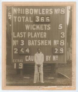 Kumar Shri Duleepsinhji. Sussex, Cambridge University, Hindus & England 1924-1932. Large original sepia photograph of Duleepsinhji standing in front of the scoreboard having scored 254no in Cambridge University&rsquo;s second innings total of 366/5 declared in 