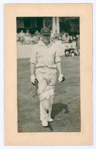 Joseph Harold Anthony Hulme. Middlesex 1929-1939. Original mono press photograph of Hulme, full length walking out to bat wearing Middlesex cap. Nicely signed in ink with dedication by Hulme &lsquo;To Bill&rsquo;. The photograph laid down to card measures overall 6&rdquo;x