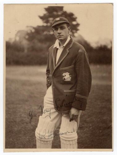 Walter Reginald Hammond. Gloucestershire & England 1920-1951. Original mono photograph of Hammond, c.1930, standing three quarter length wearing batting attire, M.C.C. tour blazer, and cap. Very nicely signed in ink to the photograph &lsquo;W.R. Hammond&rsquo;. The p