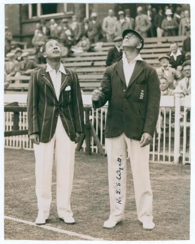 Robert Elliott Storey &lsquo;Bob&rsquo; Wyatt. Warwickshire, Worcestershire & England 1923-1951. Original mono press photograph of the captains, R.E.S. Wyatt of England and Herbie Wade of South Africa tossing for innings for the 4th Test at Old Trafford, 27th- 30th 