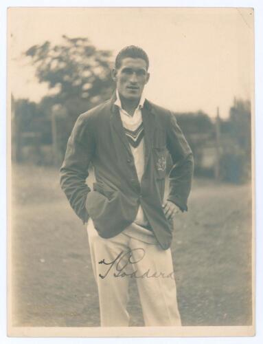 Thomas William John Goddard. Gloucestershire & England 1922-1952. Excellent mono photograph of Goddard, wearing Gloucestershire blazer and cricket attire. Nicely signed in ink by Goddard. The photograph by H.K. Fox of Gloucester. 6&rdquo;x8&rdquo;. Very minor silveri