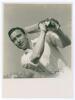 Denis Charles Scott Compton. Middlesex & England 1936-1958. Original mono photograph of Compton, half length in classic &lsquo;Brylcreem&rsquo; batting pose. Nicely signed in ink by Compton. 6.25&rdquo;x8.5&rdquo;. Some creasing, otherwise a good image in good condition