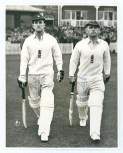 Len Hutton & Cyril Washbrook. Mono press photograph of Hutton and Washbrook walking out to bat at Trent Bridge Nottingham, with large crowd to pavilion behind, probably in the Trent Bridge Test of 1948 against the Australians. Both players wearing England