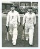 Len Hutton & Cyril Washbrook. Mono press photograph of Hutton and Washbrook walking out to bat at Trent Bridge Nottingham, with large crowd to pavilion behind, probably in the Trent Bridge Test of 1948 against the Australians. Both players wearing England