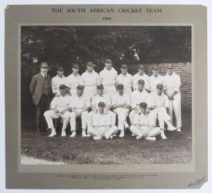 &lsquo;The South African Cricket Team 1924&rsquo;. Large and impressive sepia photograph of the South African touring team to England in 1924, seated and standing in rows, wearing cricket attire and tour caps. The photograph is laid down to official photographers mou