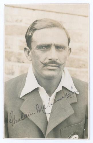 Ghulam Mohammad. Muslims, Sind & India 1924-1939. Mono postcard size photograph of Mohammad, head and shoulders, wearing Indian blazer. Signed in ink to image. Photograph by F.J. Worcer of London. Minor adhesive marks to corners on the verso otherwise in 