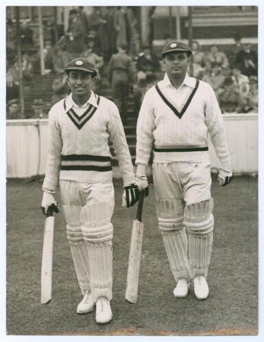 India tour to England 1946. Original mono press photograph of two Indian batsmen, S.N. Banerjee and C.T. Sarwate walking out to bat during the 1946 tour. Match unknown, most likely a tour match as Banerjee did not play in the 1946 Test series. Central Pre