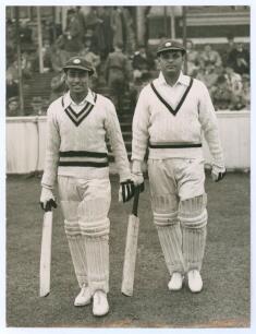 India tour to England 1946. Original mono press photograph of two Indian batsmen, S.N. Banerjee and C.T. Sarwate walking out to bat during the 1946 tour. Match unknown, most likely a tour match as Banerjee did not play in the 1946 Test series. Central Pre