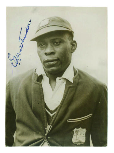 Emmanuel Alfred Martindale. Barbados & West Indies 1929-1939. Excellent pre 1939 tour, head and shoulders, press photograph of Martindale wearing West Indies cap and blazer. Nicely signed in ink by Martindale. 6&rdquo;x8&rdquo;. Keystone Press Agency photograph. Exce
